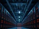 Interior of a modern AI data center with rows of server racks.