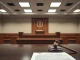 Courtroom scene symbolizing Binance's legal victory in Alabama federal court over terrorism financing allegations.