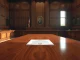 Federal courtroom scene representing Binance's legal victory in Alabama terrorism financing case dismissal