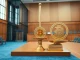 Bitcoin regulatory challenge: symbolic scale weighing Bitcoin against traditional banking assets under Basel framework scrutiny