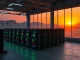 Bitcoin mining facility in Iran showing ASIC miners with LED lights in industrial setting during sunset