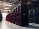 Bitcoin mining hardware in a data center during industry profitability pressure.