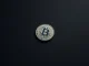 American nickel coin compared to digital Bitcoin symbol representing the viral investment meme.