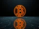 Bitcoin symbol on cracking surface representing price support testing and market volatility.