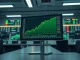 Bitcoin rebounds on a financial analyst's screen as investors return during global market uncertainty.