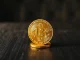 Bitcoin coin symbol representing the stalled relief rally and persistent bear market conditions.