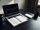 Analyst reviewing Bitcoin SV price charts and market data on a laptop.