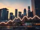 Bitdeer Bitcoin sale and Asia crypto news in 2026 showing financial district and market trends