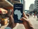 Blockchain.com Ghana expansion shown through smartphone cryptocurrency trading in Accra