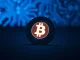 Crypto casino chip with Bitcoin symbol representing New Zealand's digital gambling revolution.