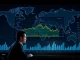 Analysts monitor steady Bitcoin price charts amid geopolitical tension, signaling crypto market resilience.