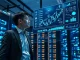 Analyst reviews blockchain and market data showing DePIN and AI crypto asset gains.