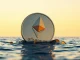 Ethereum whale accumulation and market rebound illustrated by a large ETH coin in a digital ocean at dawn.