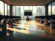 Empty financial trading floor representing declining finance job openings and sector layoffs in 2026.