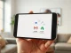Google's Personal Intelligence AI feature connecting user data across Gmail and Photos on a smartphone.