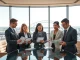 Australian financial professionals discussing cryptocurrency investment options for pension funds