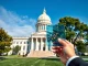 Indiana State Capitol with digital asset visualization representing crypto bill HB1042 legislation