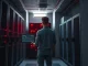 Technician monitoring cryptocurrency servers in Iran during market disruption after US-Israeli strikes