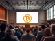 Conference hall at Digital Asset Summit NYC 2026 featuring Lombard and Blockworks Bitcoin track presentation.
