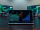 Analysis of the next cryptocurrency to explode showing BNB, Monero, and DeepSnitch AI price charts on smartphone screen.