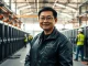 Nvidia CEO Jensen Huang in an AI data center construction site discussing infrastructure job creation.