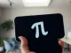 Analysis of Pi Network price prediction and its development status on a smartphone screen
