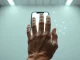 VeryAI palm-scan identity verification on Solana blockchain for detecting AI-generated accounts.