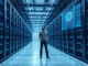 Engineer analyzing holographic neural network in data center, representing the risks of scaling next-generation AI systems.