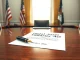 Trump administration sets March 1 deadline for the landmark Crypto CLARITY Act on a document in a government office.