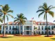 Mar-a-Lago estate where Trump memecoin holders gather for exclusive crypto gala event.