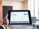 VersaBank's tokenized deposit platform enabling real-time cross-border currency conversion between US and Canadian dollars.