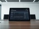 Digital tablet showing WLFI governance proposal results on a boardroom table.