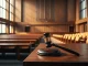 A courtroom gavel symbolizing the lawsuit against Elon Musk's xAI over AI-generated child abuse imagery.