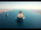 Oil tanker and US Navy ship in the Strait of Hormuz during geopolitical tensions affecting Bitcoin and oil prices.