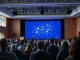 Audience at the HumanX AI conference in San Francisco watching a presentation on AI agent technology.