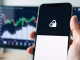 Smartphone with push notification symbol representing crypto news privacy concerns raised by Pavel Durov.