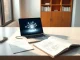 AI glossary terms visualized on a laptop screen with a notebook, explaining artificial intelligence concepts.