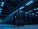 Interior of a large Bitcoin mining facility with rows of ASIC machines illuminated by blue LEDs