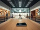iPhone 16 displayed in an Apple Store, representing the device at the center of a class-action lawsuit over delayed AI features.