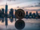 Binance Coin (BNB) cryptocurrency coin on reflective surface with city skyline background