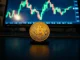 Bitcoin coin on a chart with Bollinger Bands indicating a potential breakout
