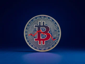 Bitcoin coin with internal graph showing a bearish trend for cryptocurrency market analysis.
