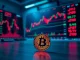 Bitcoin coin in front of trading charts showing price volatility