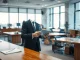 Lawyer using AI-powered tablet in modern law office with holographic legal interface