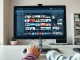 Person using Clouted software dashboard for AI video clipping and social media distribution