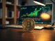Bitcoin coin on desk with laptop showing ETF chart, representing crypto news and Bitcoin ETF inflows