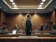 Elon Musk testifying in a California federal courtroom about AI distillation practices