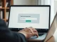 User reviewing a clear transaction signing prompt on a laptop in a home office, representing enhanced wallet security