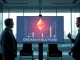 Two professionals in a glass conference room reviewing a digital display showing an Ethereum logo and a fund performance chart.