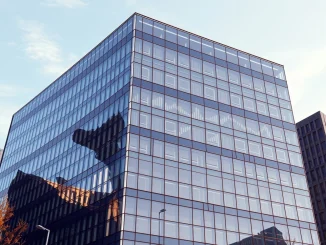 Modern corporate office building representing the business headquarters of GameStop and eBay amid a takeover bid.